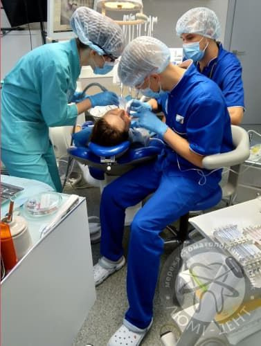 Cutting teeth under veneers photo Lumi-Dent